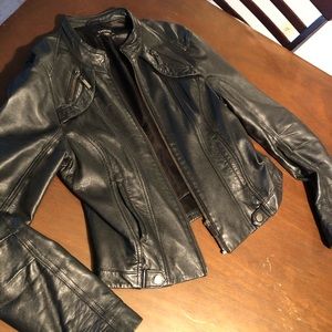Bebe woman’s zip up leather jacket